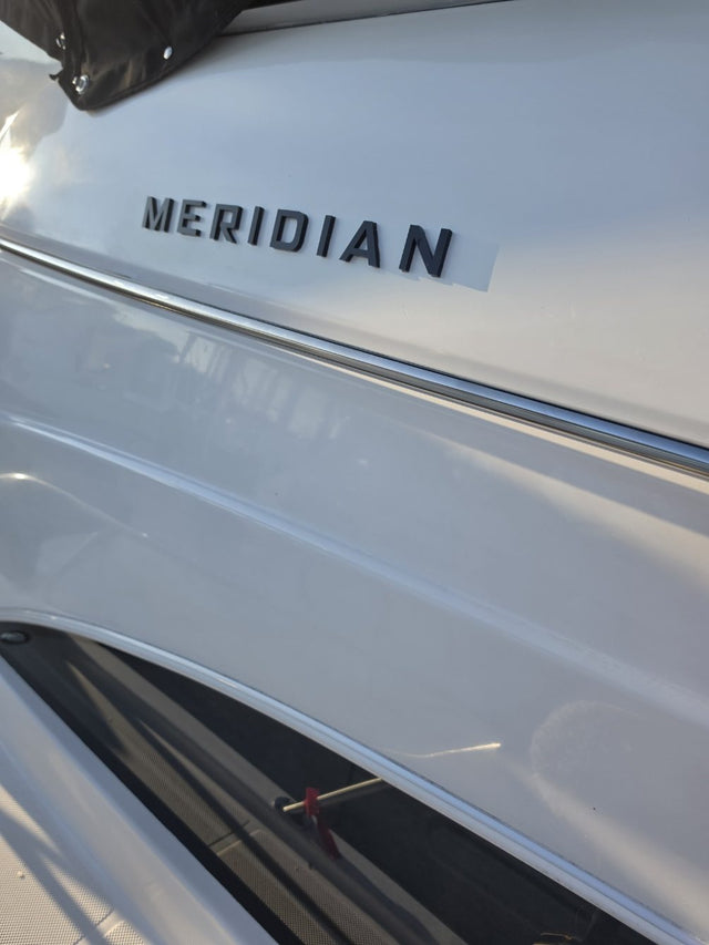 Black dimensional Meridian lettering, second view