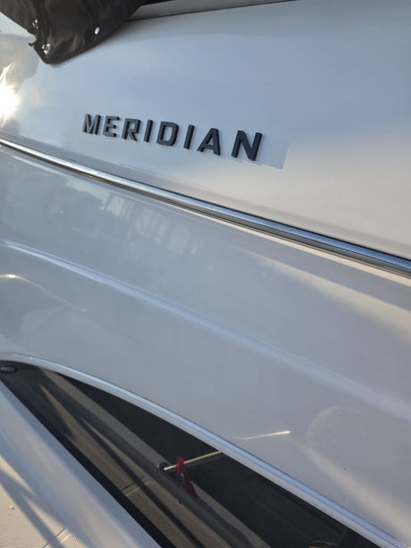 Black dimensional Meridian lettering, second view